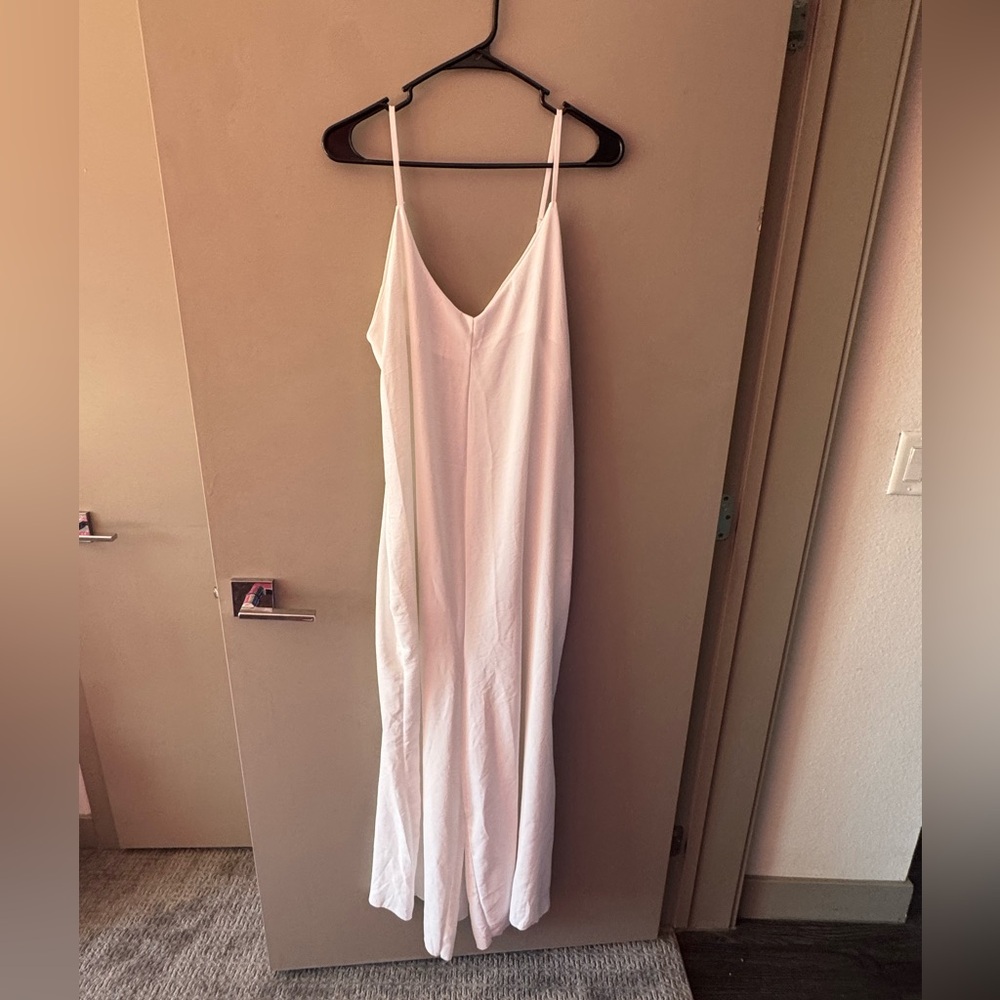 Chic white flowy spaghetti strap jumpsuit